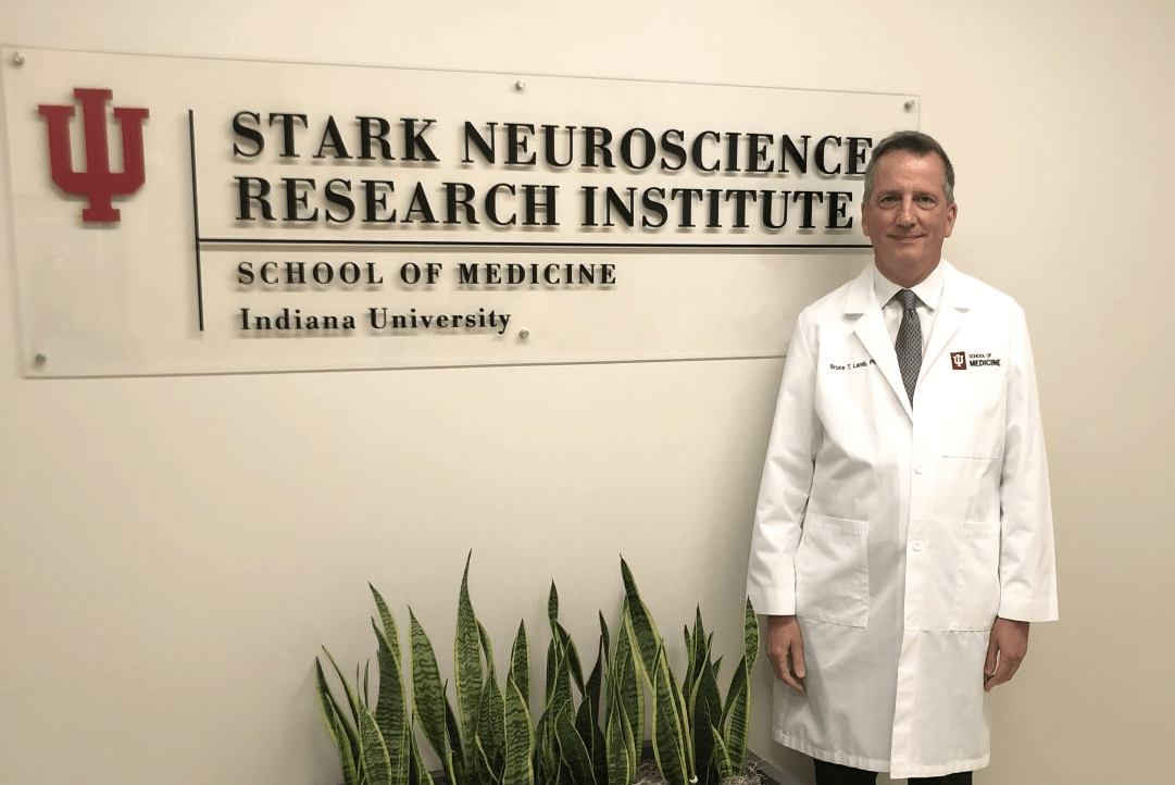 portrait of bruce lamb in front of the stark neurosciences space