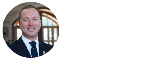 A guy smiling headshot