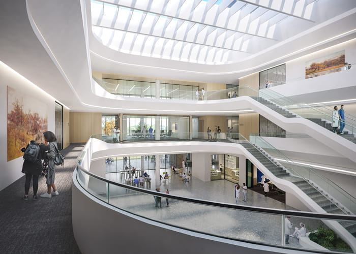 interior rendering of the new building shows a light filled atrium and large staircase