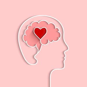 outline of a person's head and brain with a heart in the brain 