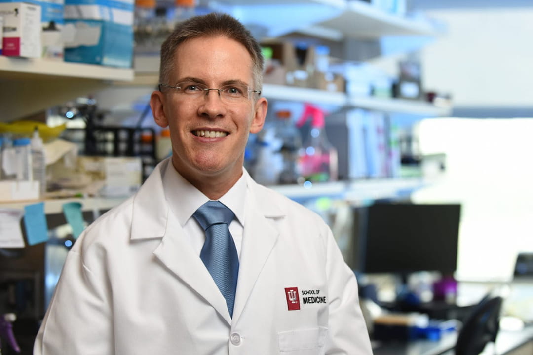 portrait of dr. corson in the lab