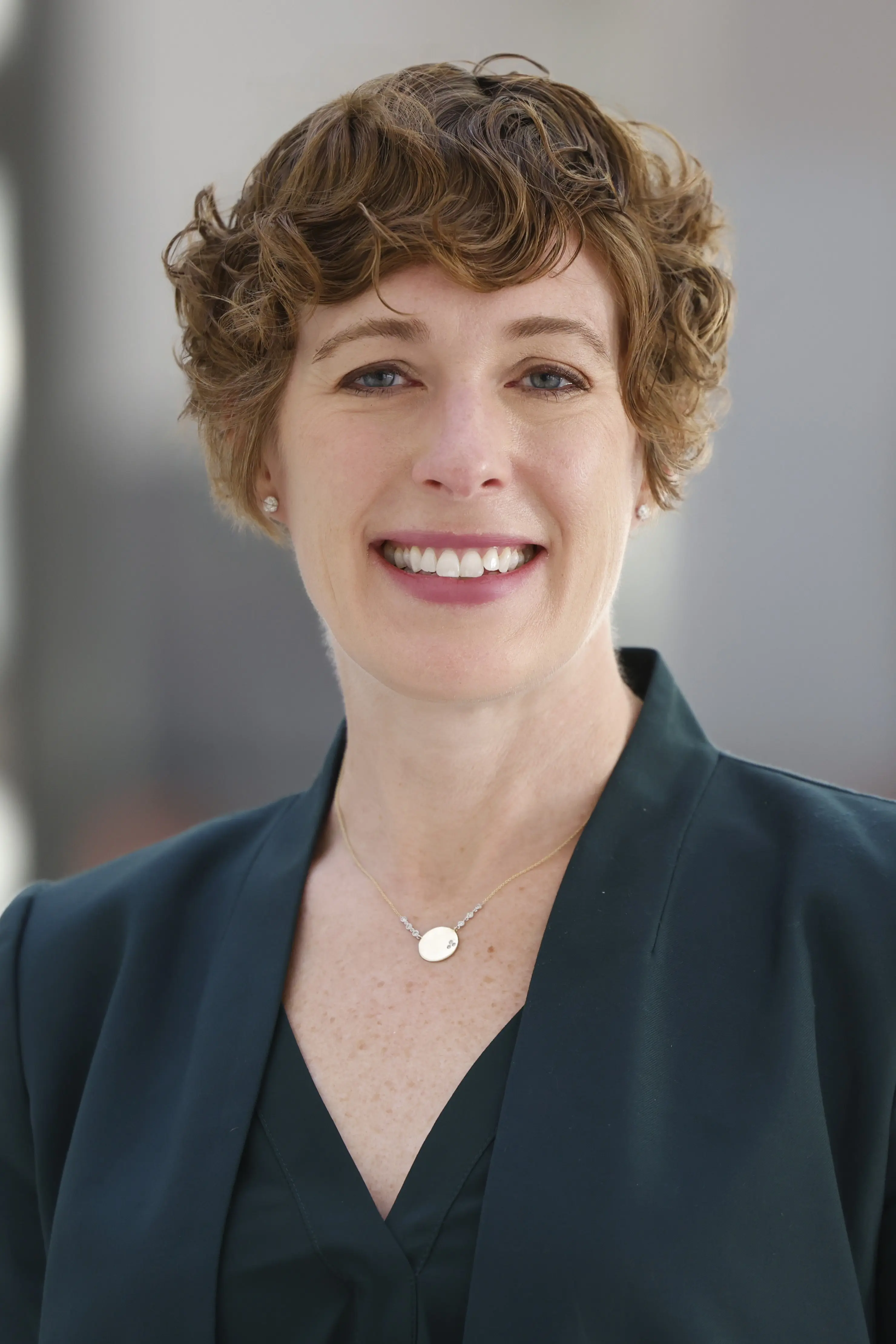 a headshot of Heather Perdue