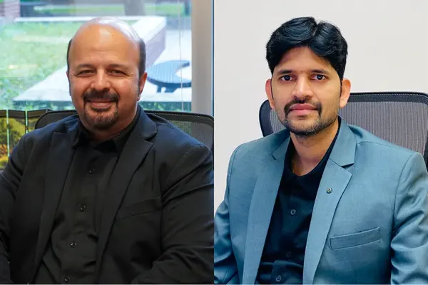 Two researchers pose for headshots