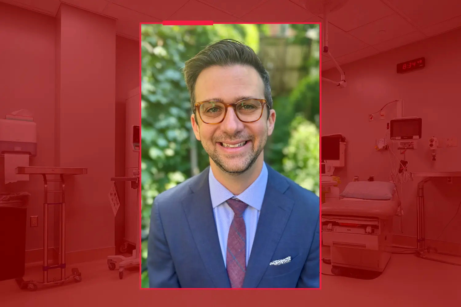 headshot of Matthew Feinstein with trees in the background in front of a red background 