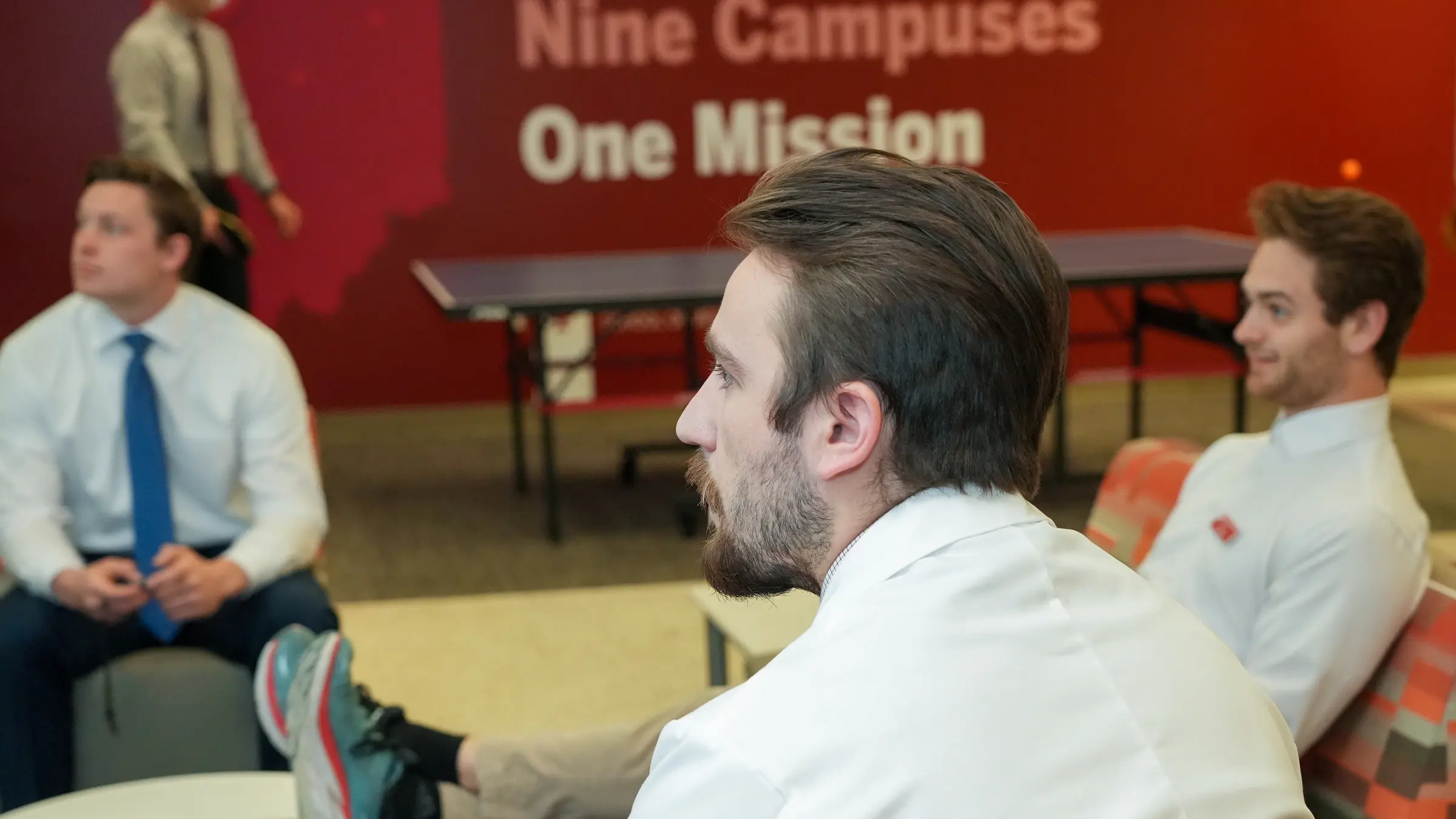 medical students listen at a mentoring talk with a physician