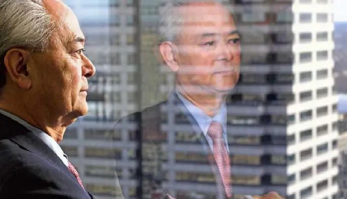 August Watanabe and reflection in window. 