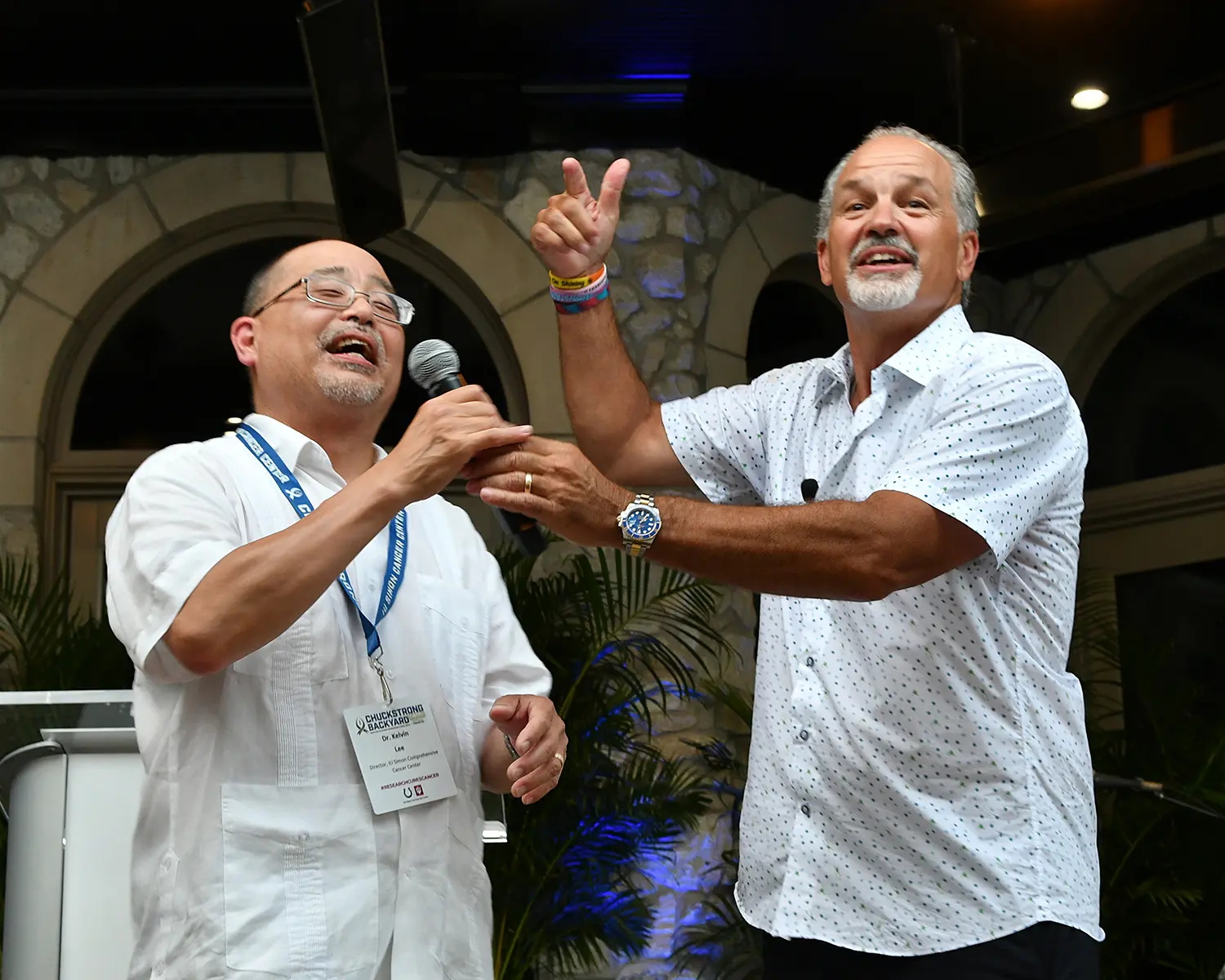 Lee and Pagano speak during the Chuckstrong Backyard Huddle.