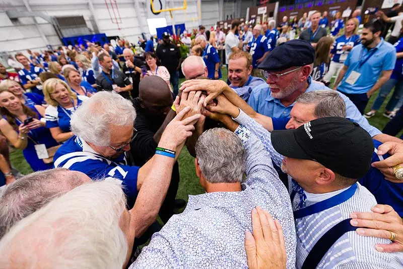 Chuckstrong huddle