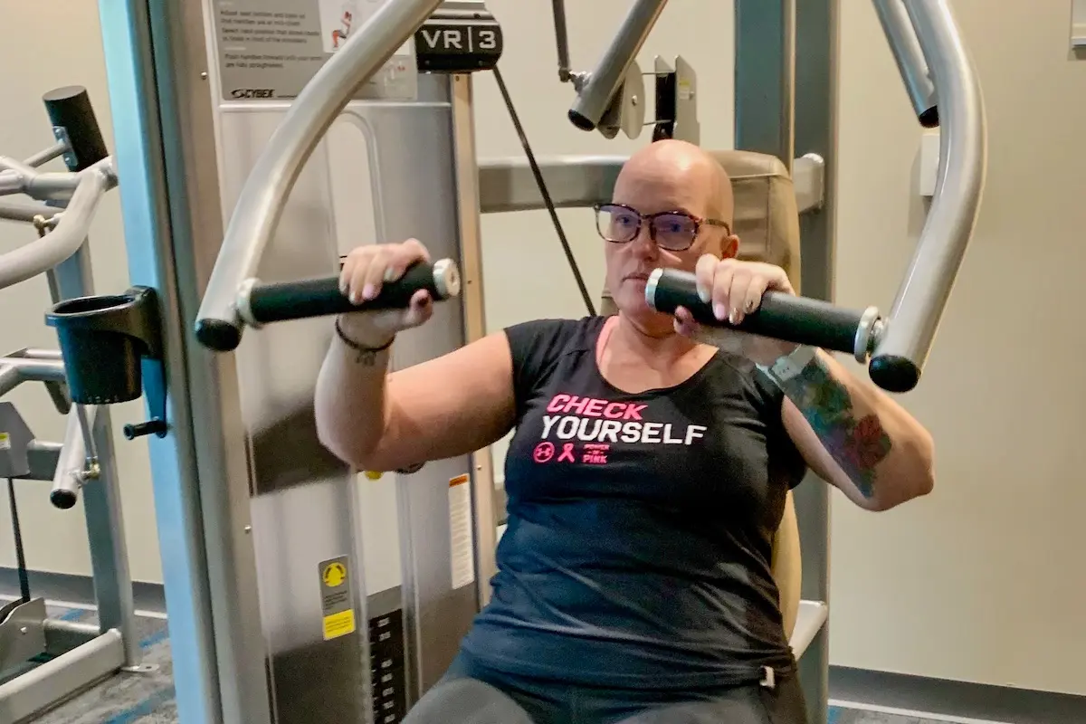 Jennifer Hedges on an exercise machine