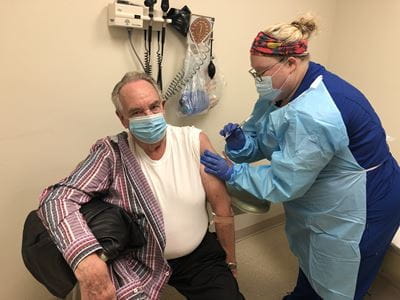 Joe Morris gets shot during AstraZeneca COVID-19 vaccine study