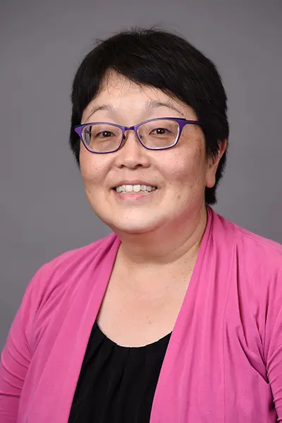 An image of Kellie Kaneshiro, Assistant Director for Library Technology at the Ruth Lilly Medical Library. 