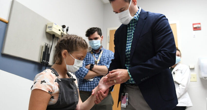 Doctor examines Khloe Hairell 