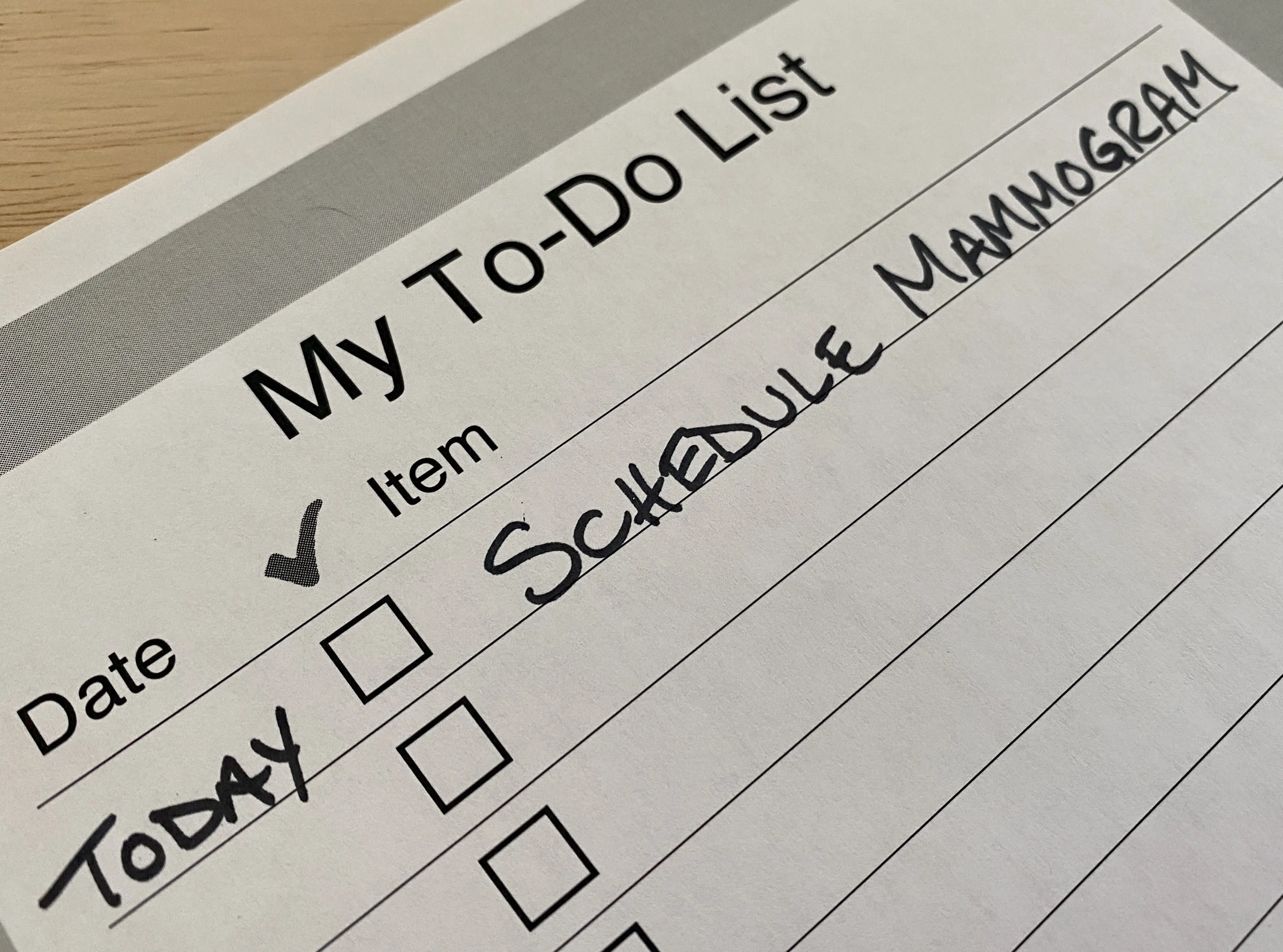 a to-do list shows a handwritten note to schedule a mammogram