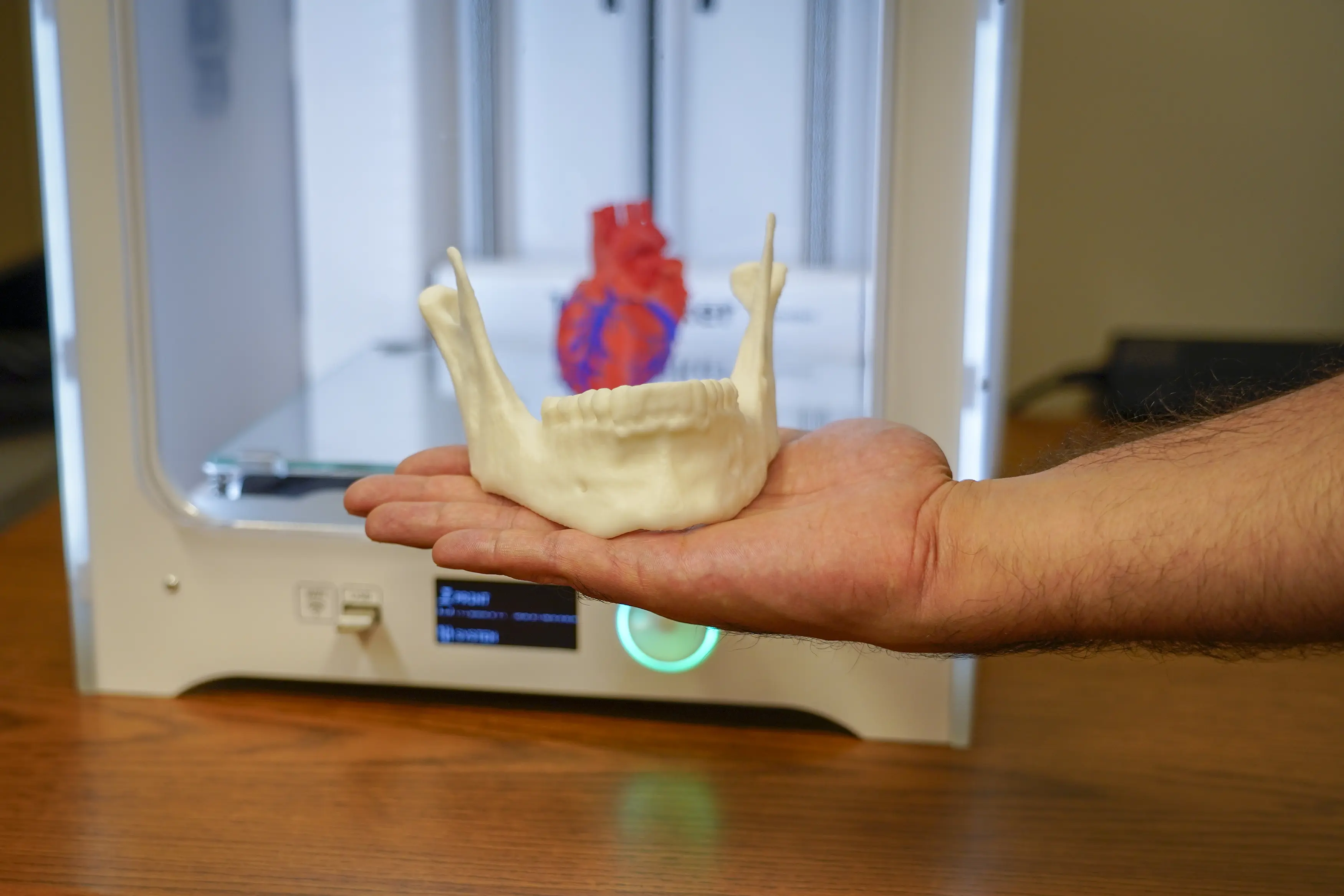 an image of hand holding a 3D printed module