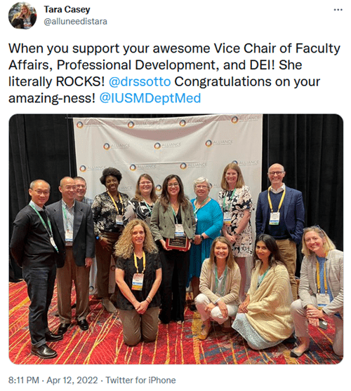 Tweet by Tara Casey: "When you support your awesome Vice Chair for Faculty Affairs, Professional Development, and DEI! She literally ROCKS! @drssotto congratulations on your amazing-ness! @IUSMDeptMed". Photo of Dr. Sotto, center, posing with numerous Dept. of Medicine colleagues.