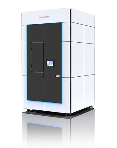 the titan krios microscope is a futuristic white paneled box with a large black door