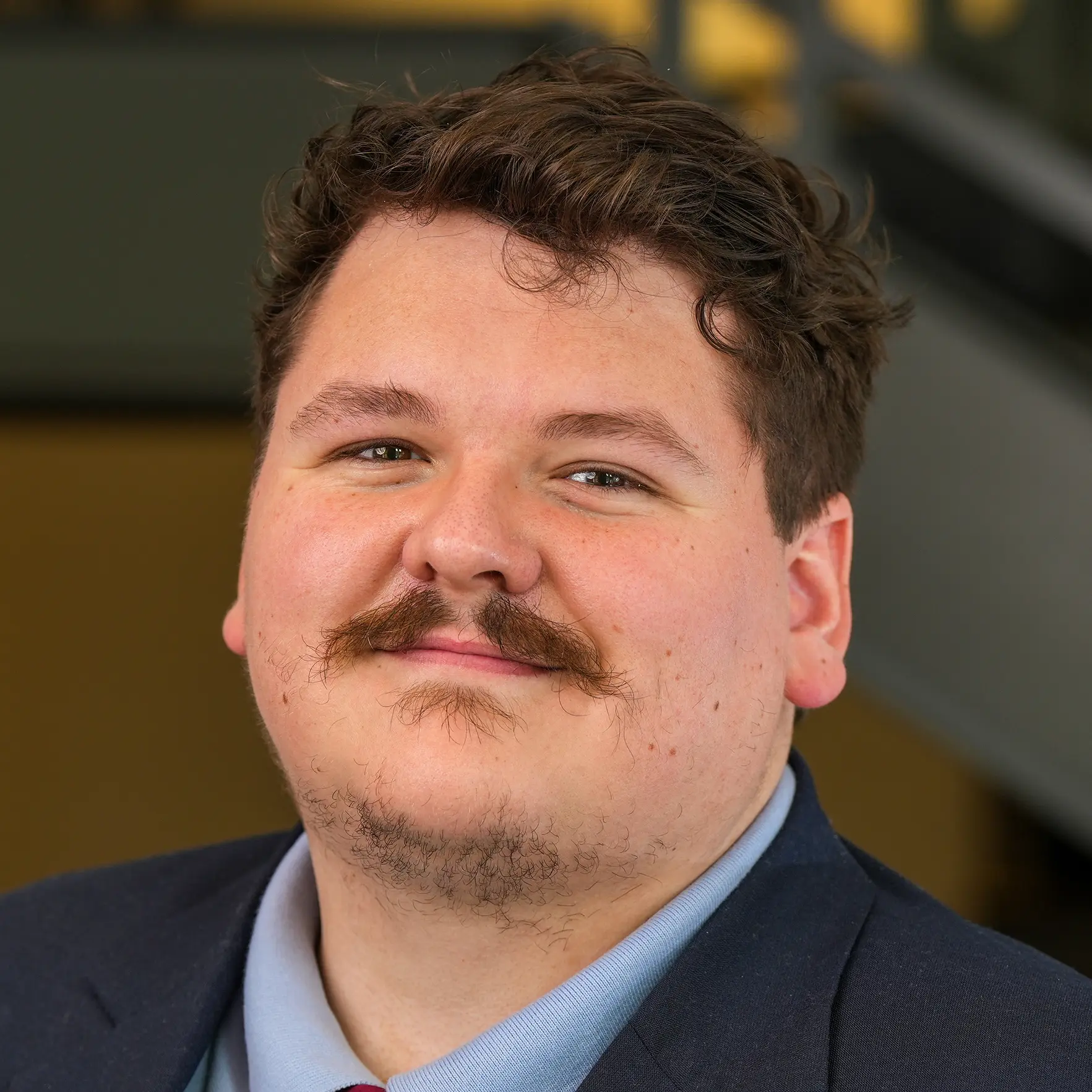 Headshot of Travis Reeves