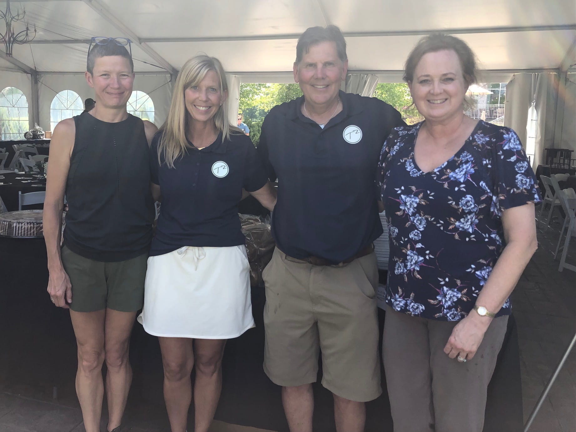 Tyler Trent golf outing - Tyler's parents with Jamie Renbarger and Karen Pollok