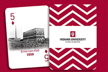 Postcard with IU School of Mediicne logo on one side and Emerson Hall on a 5 of diamonds playing card on the other side 