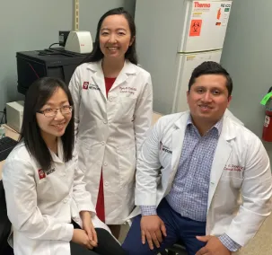 Drs. Yujin Park, Angela Chen, and Kevin Lopez are residents participating in research years in Dr. Burcin Ekser's xenotransplantation lab.