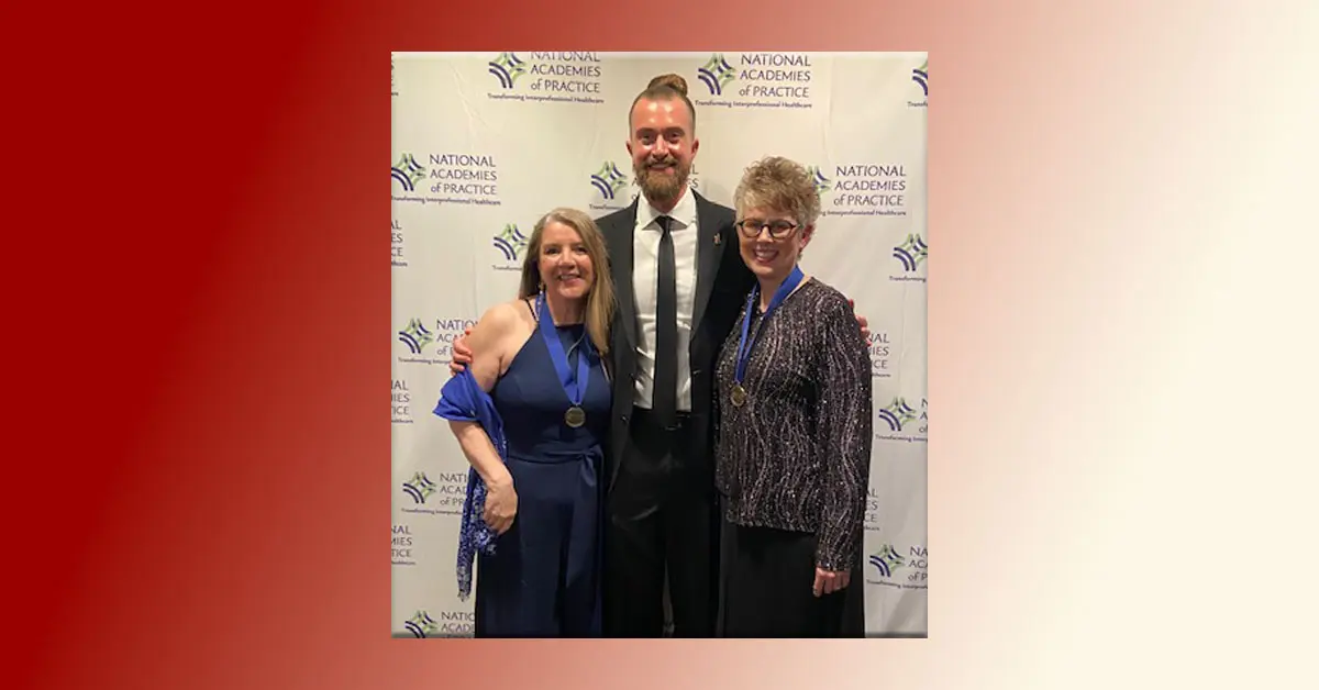 Three Individuals on red carpet at NAP
