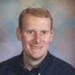 A headshot of Brian Howard