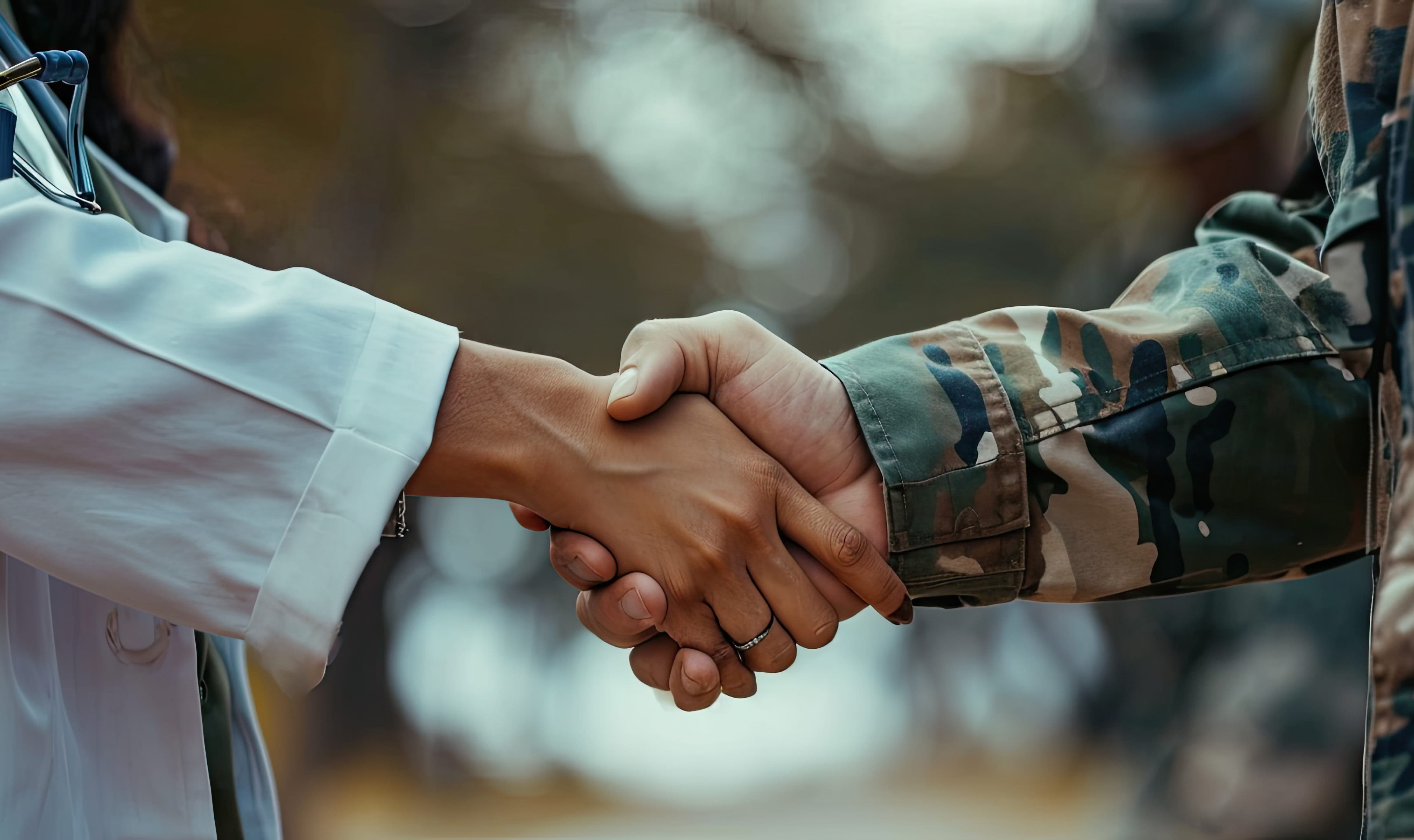 doctor and veteran shaking hands