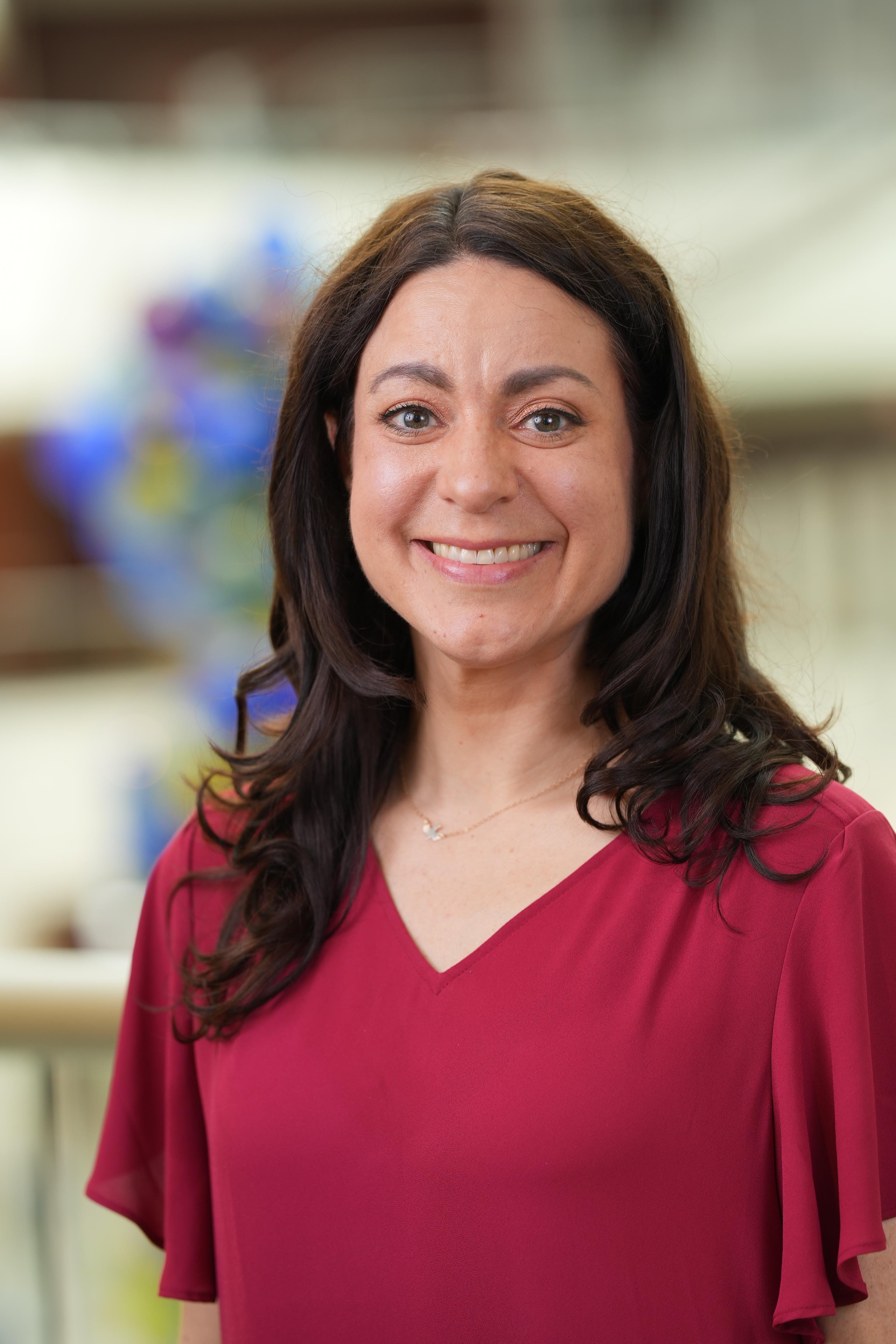 A headshot of Kelley Folkening