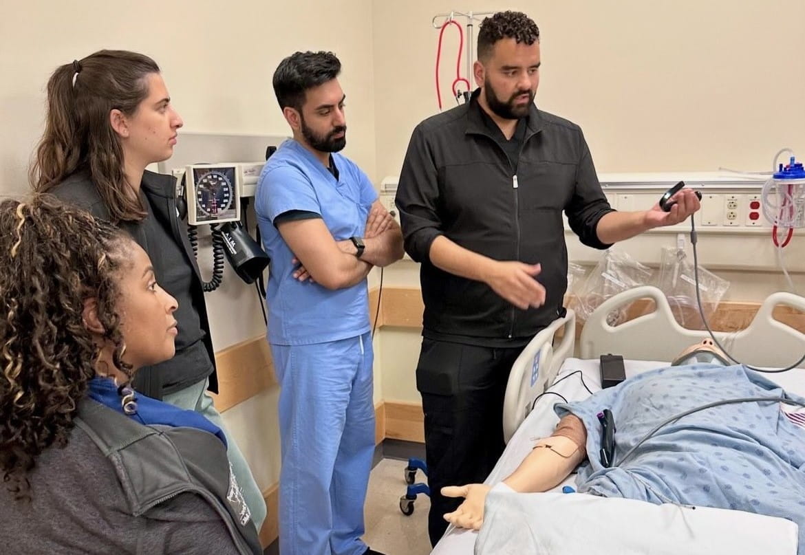 fellows practice hands on training in the simulation center