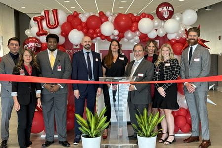 Team members celebrate the Medical Laboratory Scientist Program expansion with a ribbon cutting ceremony on August 14.