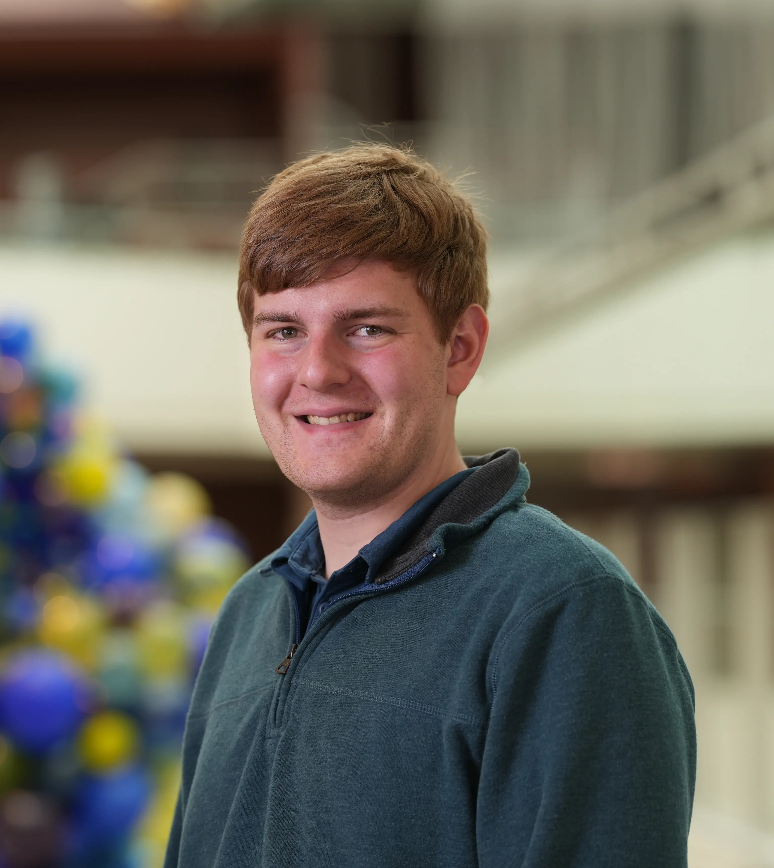 A headshot of Trace Leapley