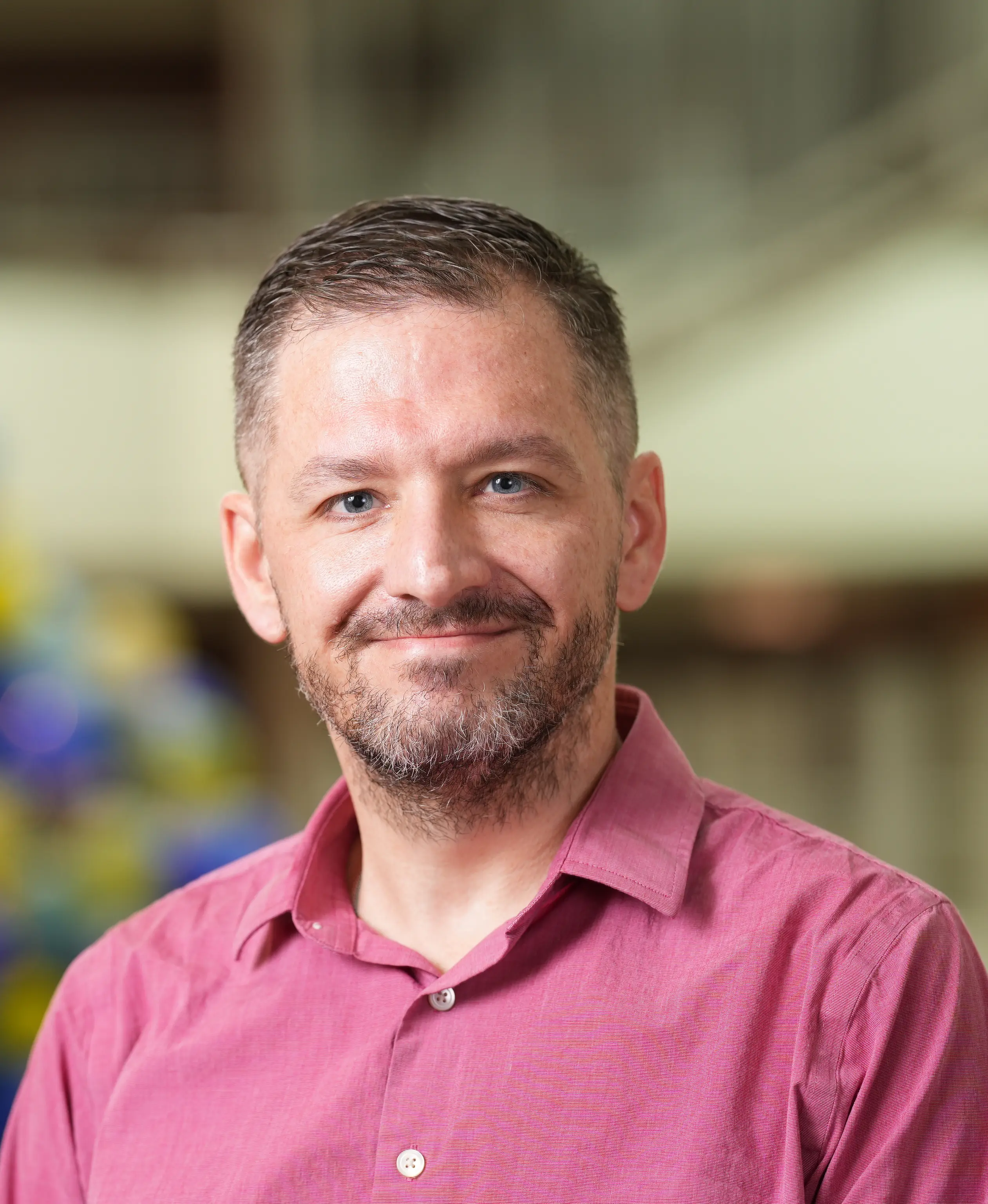 a headshot of Nick Mclain