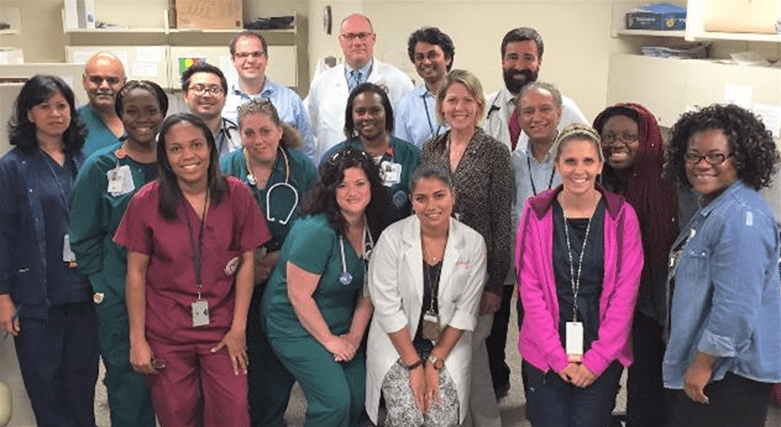 group of physicians posing for group photo
