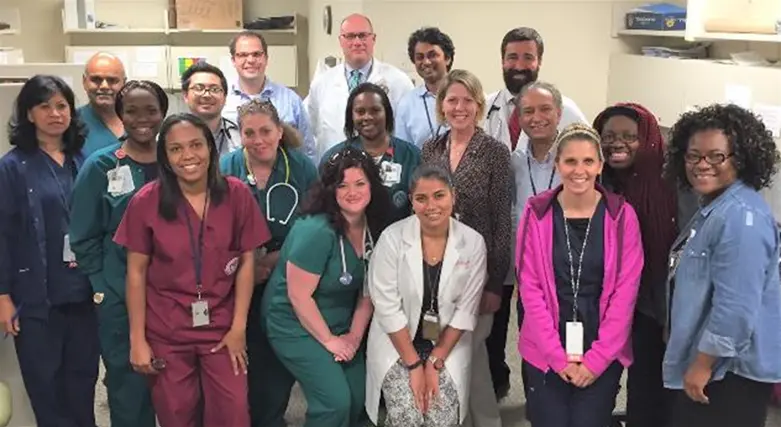 group of physicians posing for group photo