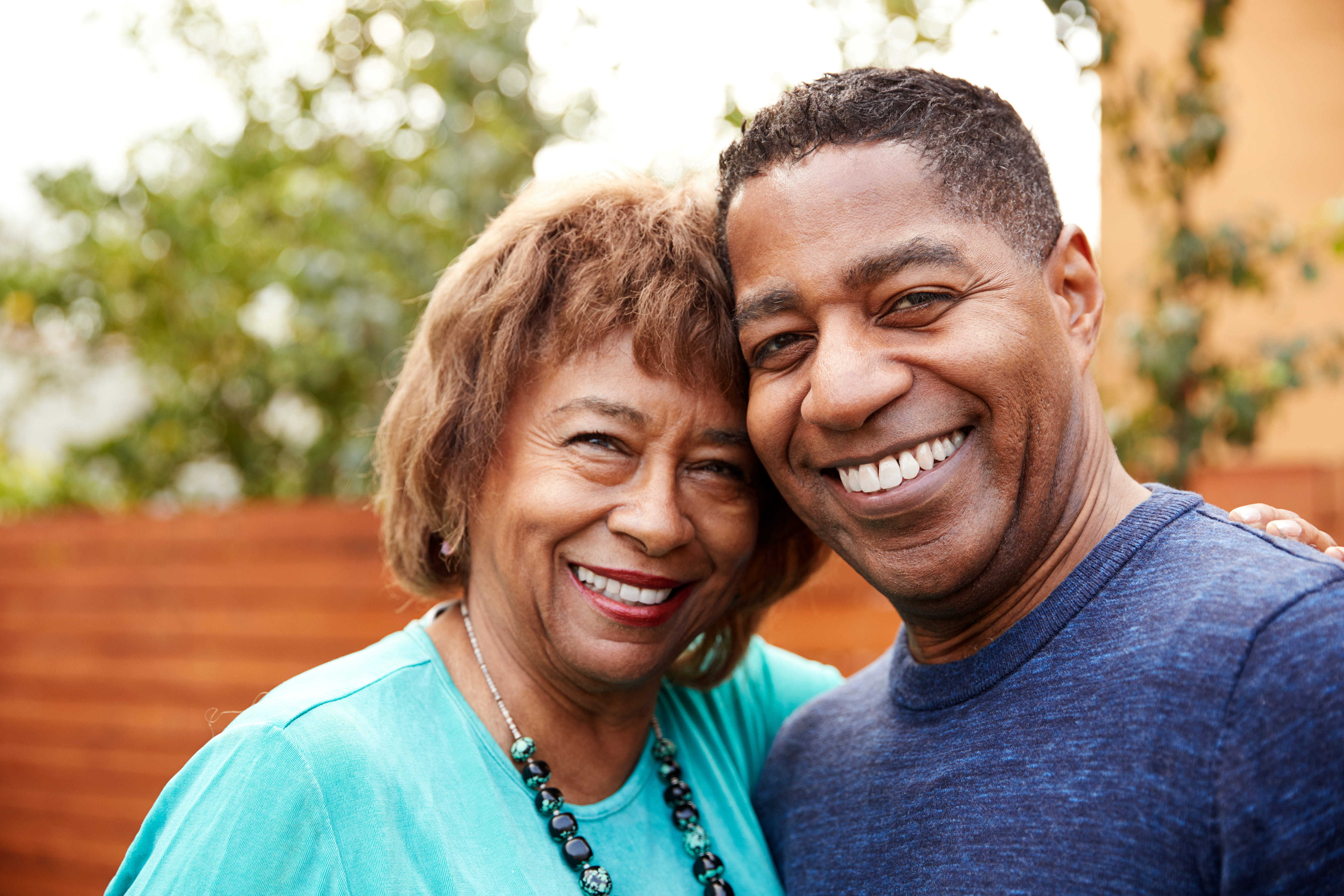 Older African Woman outside with her adult son