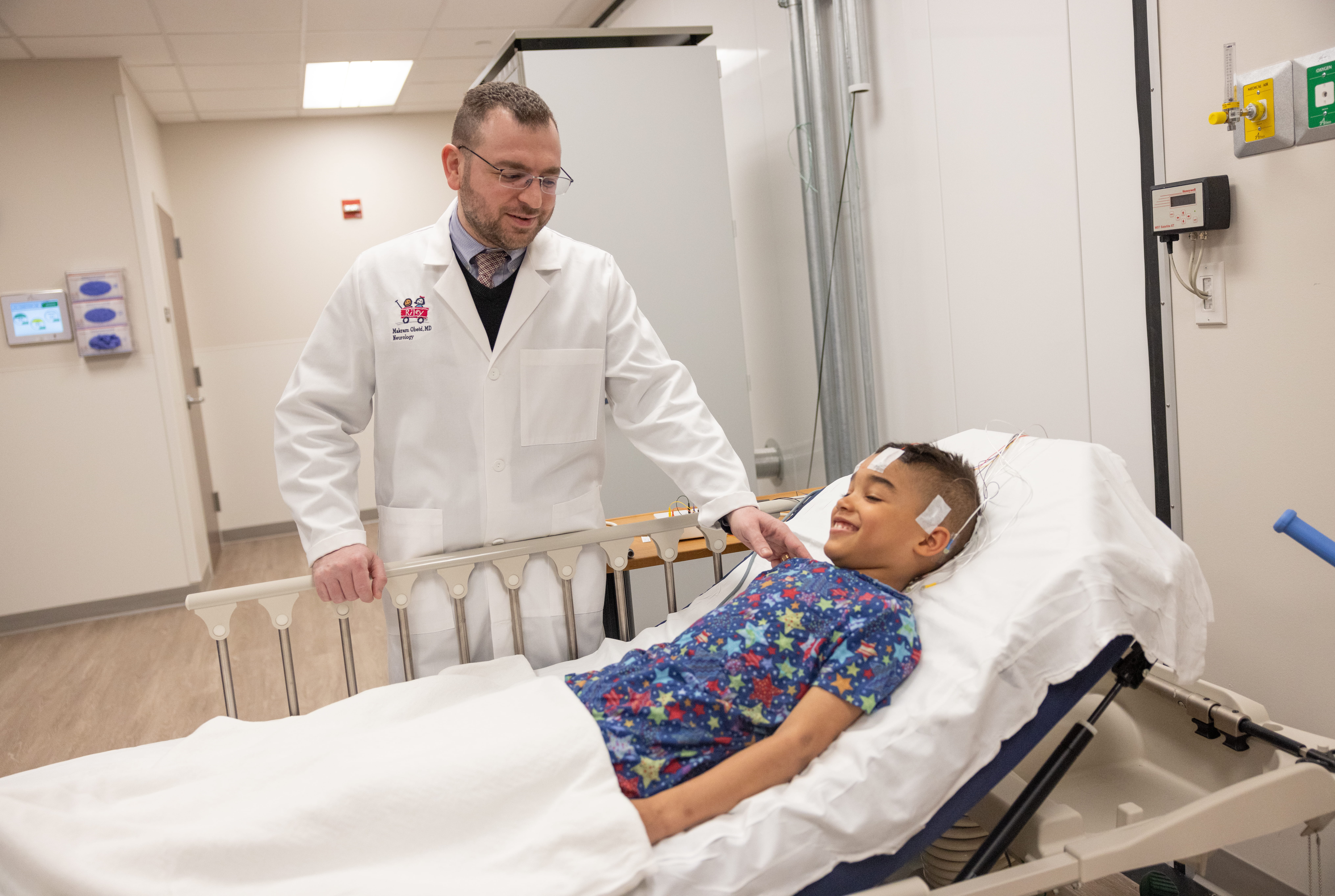 a doctor visits with a child in the clinic