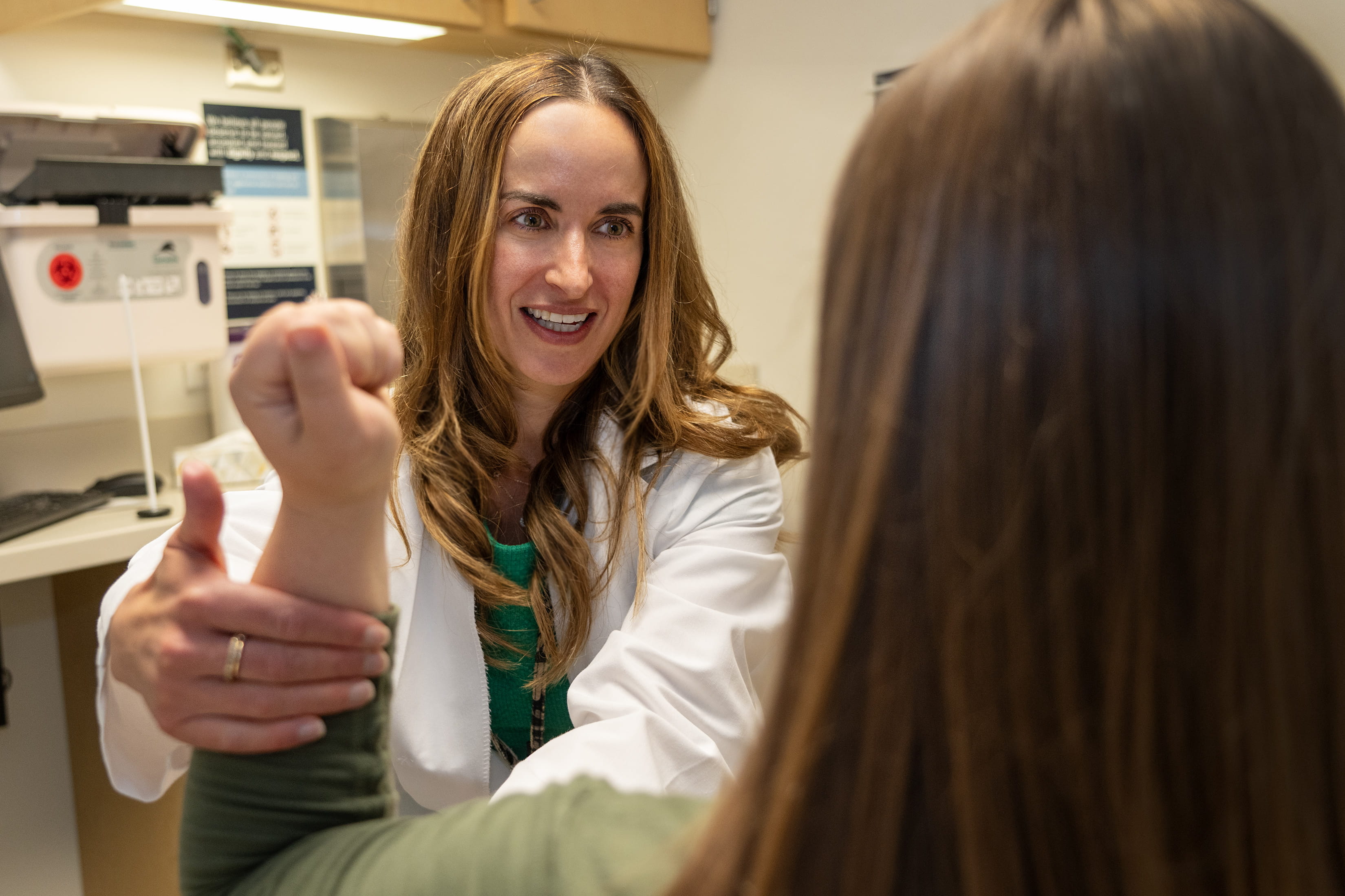 Dr. Kathryn Nevel meeting with a patient