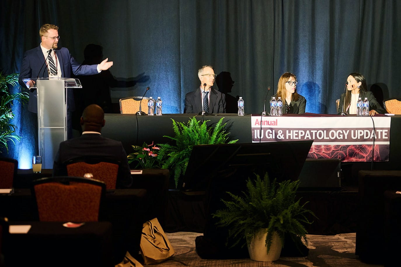 Photo of Dr. Gromski addressing the panel at IU GI Update 2025.