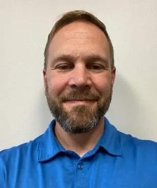 Headshot photo of person on research team