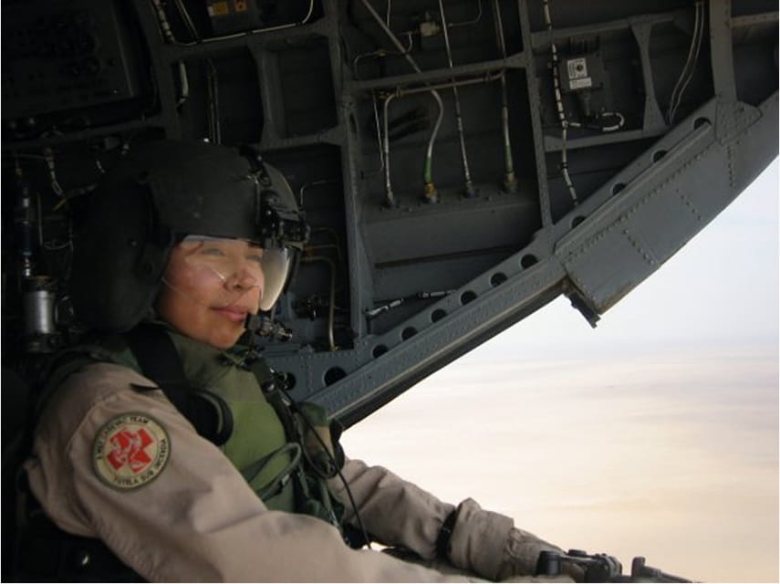 Guadalupe Jimenez looks out from a helicopter.