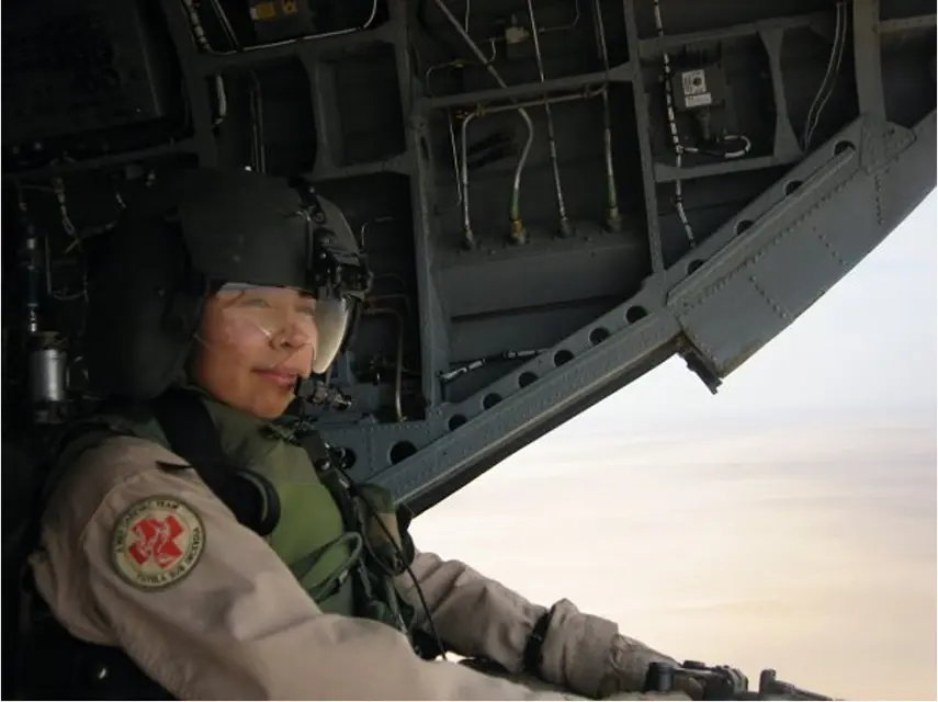 Guadalupe Jimenez looks out from a helicopter.