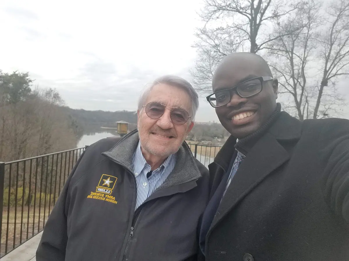 David Gerkin poses with  Innocent Byiringiro