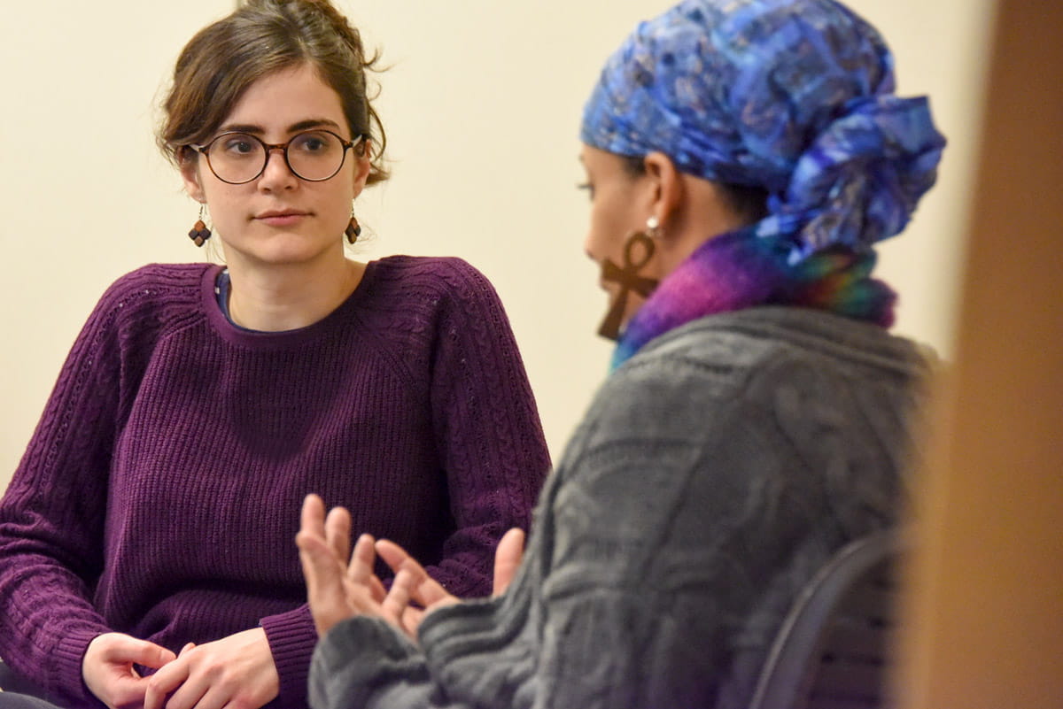 A resident practices communications skills during a session of IU Talk.