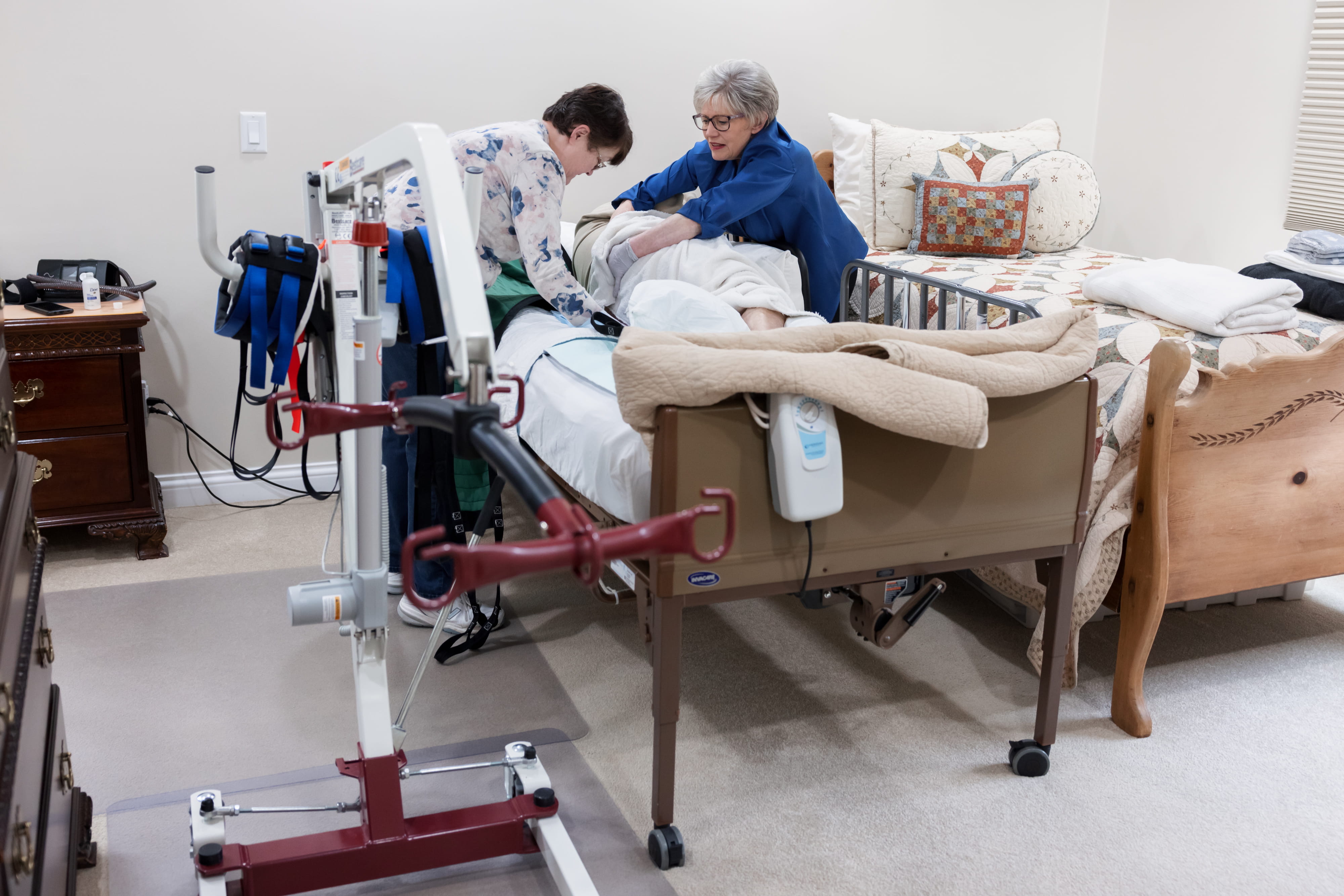 Assisting a patient in bed
