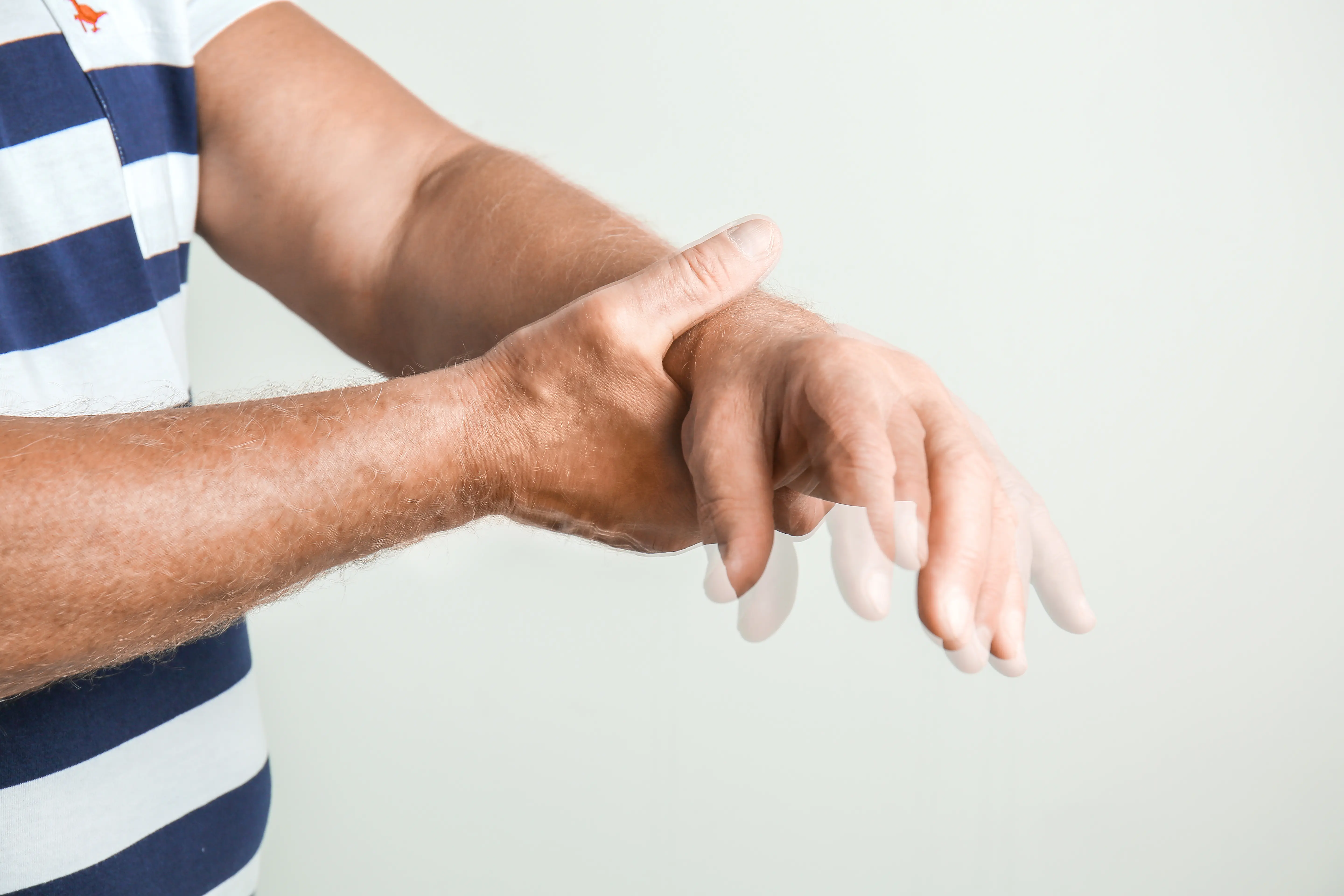 guy holding his hand