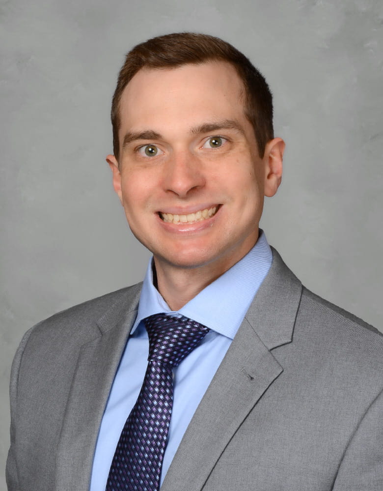 A headshot of Christopher Blanco