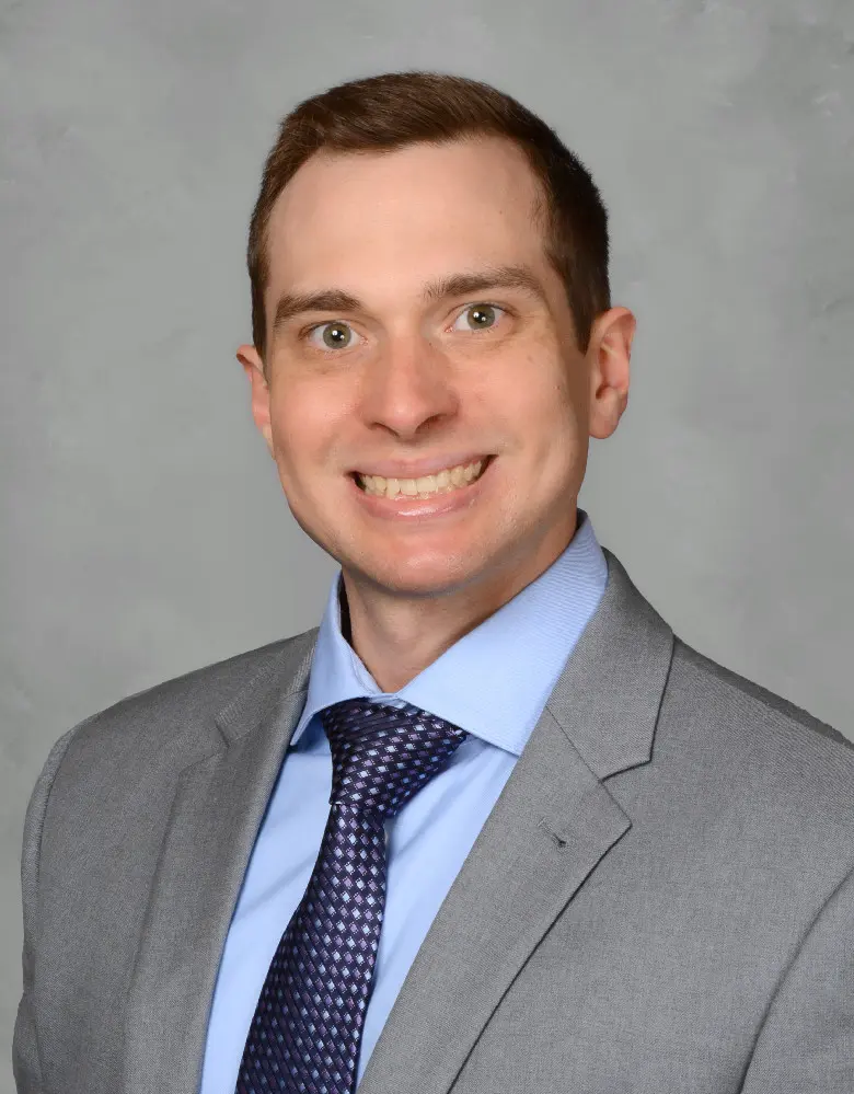 A headshot of Christopher Blanco