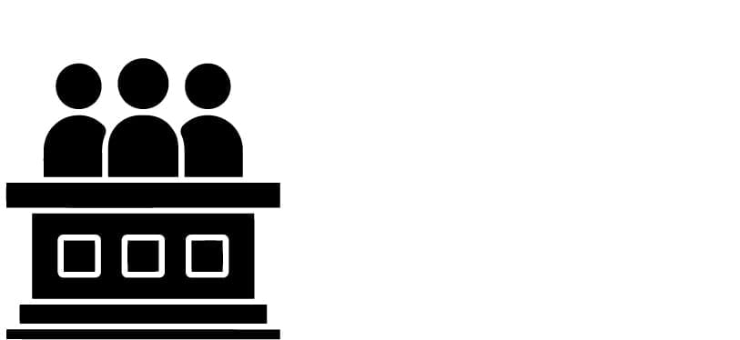 three people at a podium