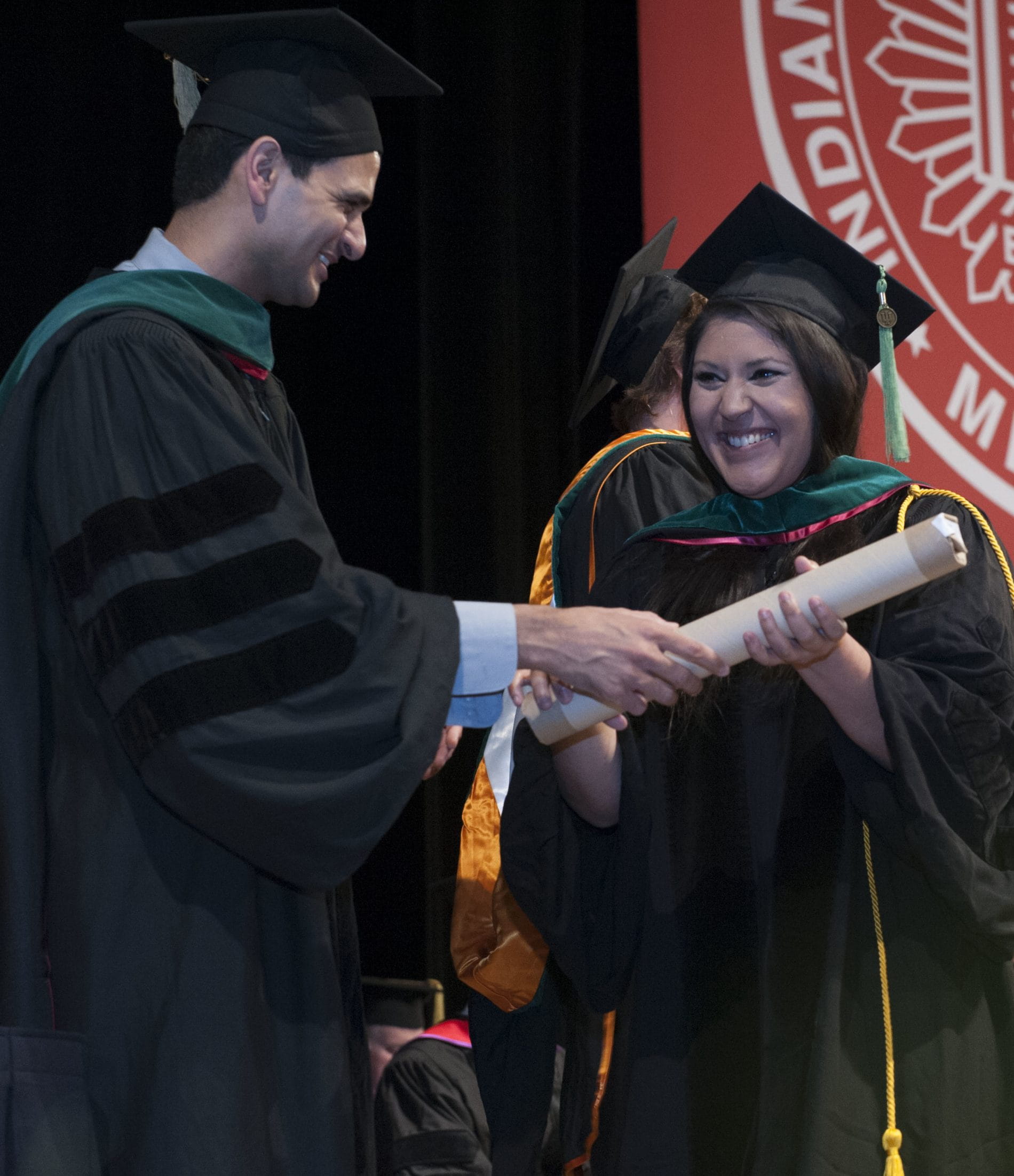 IU School of Medicine Commencement May 10, 2014, student receiving diploma