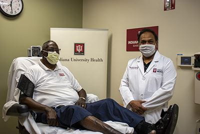 Chandan Sen, PhD meets with Donnell Hayes, the consortium's first patient. Chandan Sen, PhD and Donnell Hayes